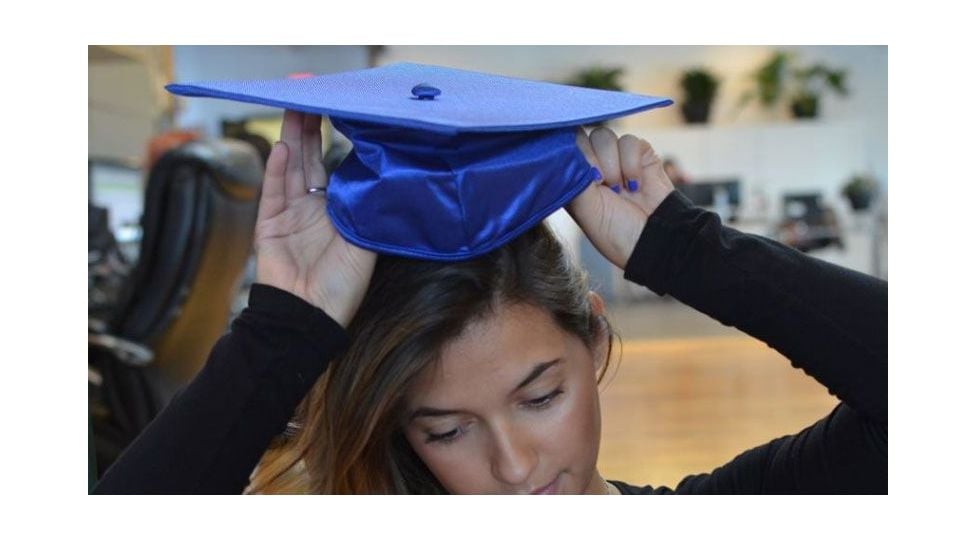 wearing a graduation cap