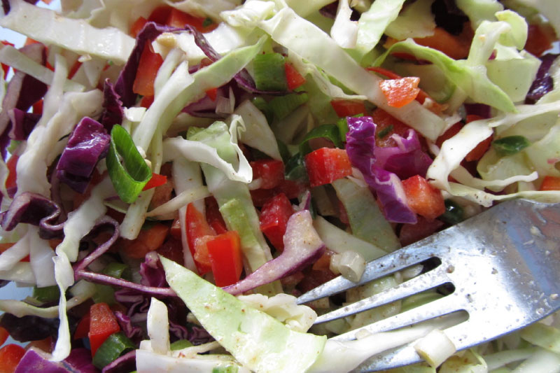 Marinated coleslaw served in a bowl