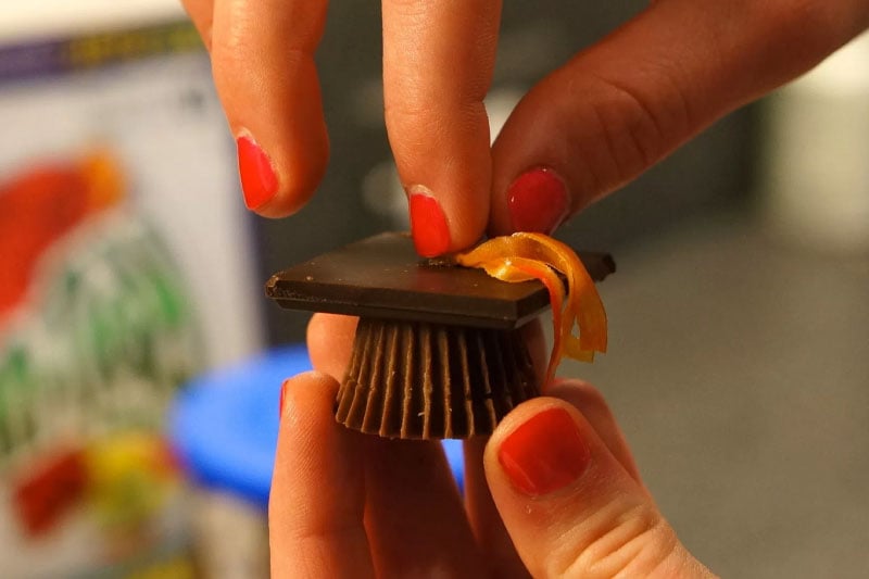Graduation cap chocolates made from peanut butter cups and graham crackers