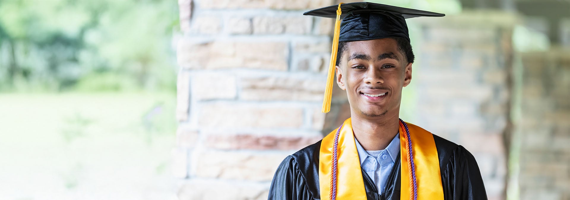 High school graduates in caps and gowns
