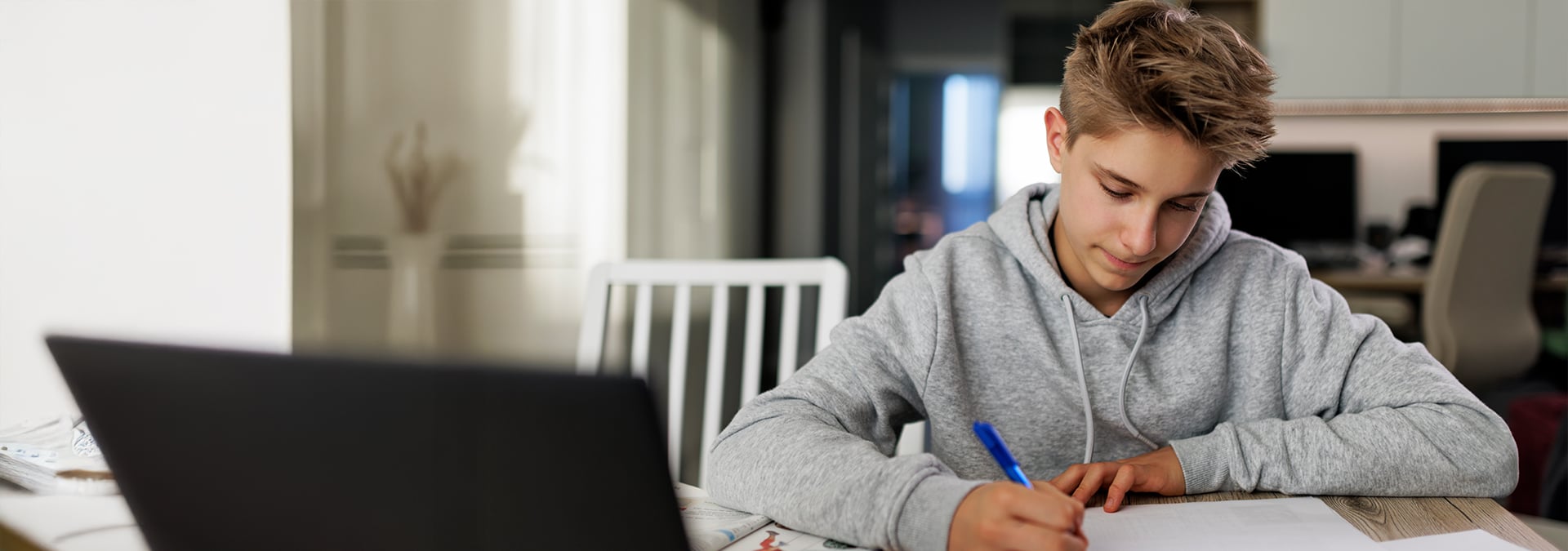 Homeschool student studying at a table