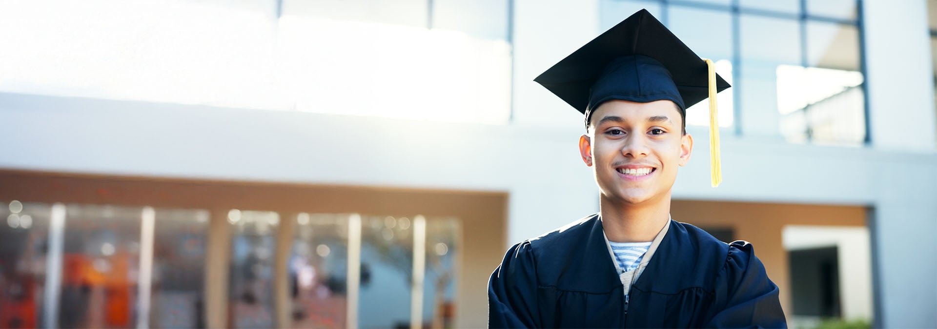 Middle school graduates in caps and gowns