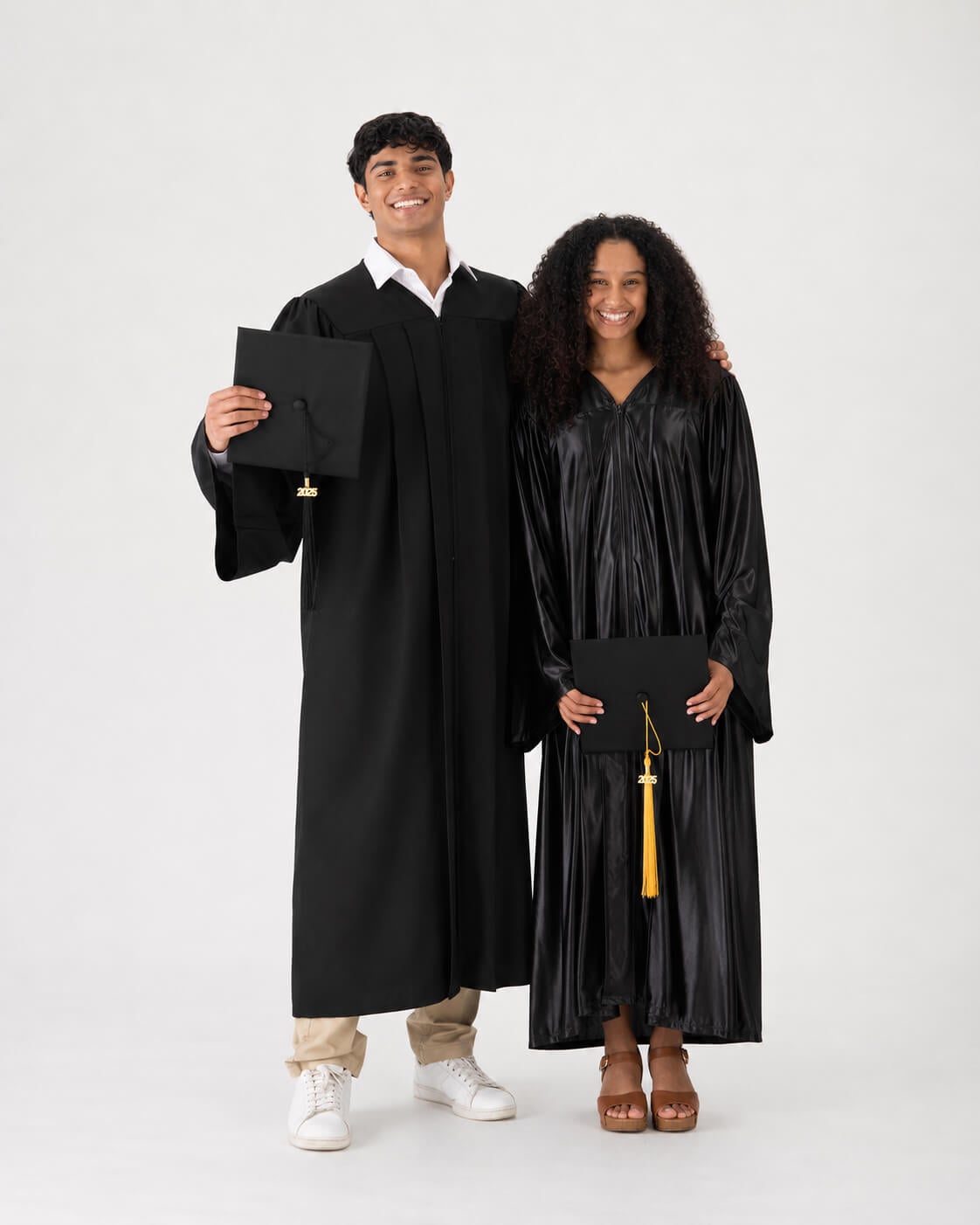 Graduate wearing a shiny black GraduationSource cap and gown
